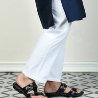 man wearing black slipper